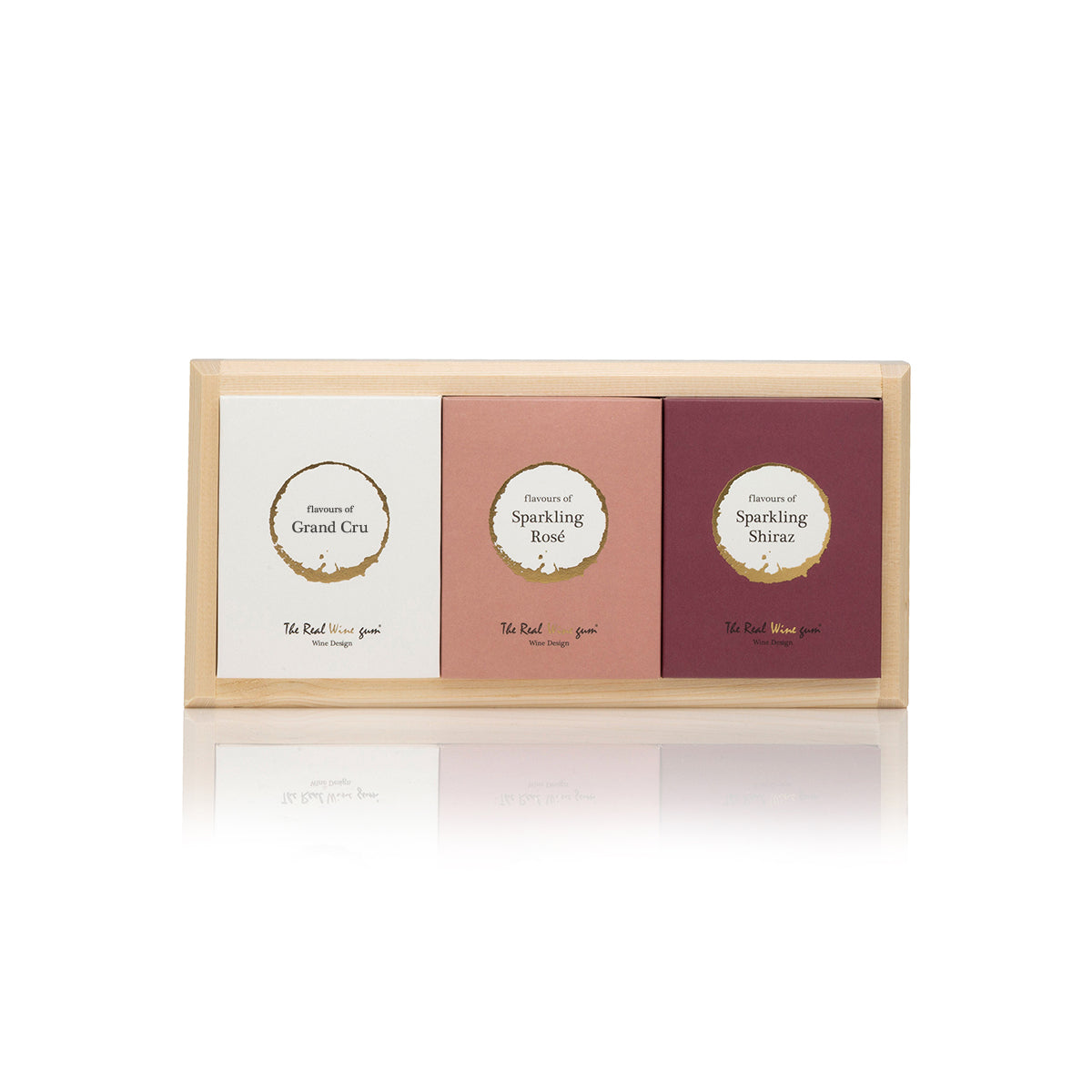 De "Real Wine Gums" Grand Cru, Sparkling Rosé en Sparkling Shiraz in houten kadoverpakking